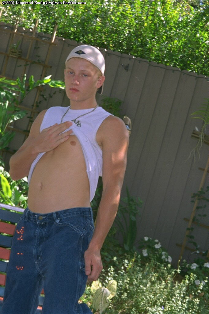 Handsome gay blonde Matthew undressing and masturbating in the back yard  